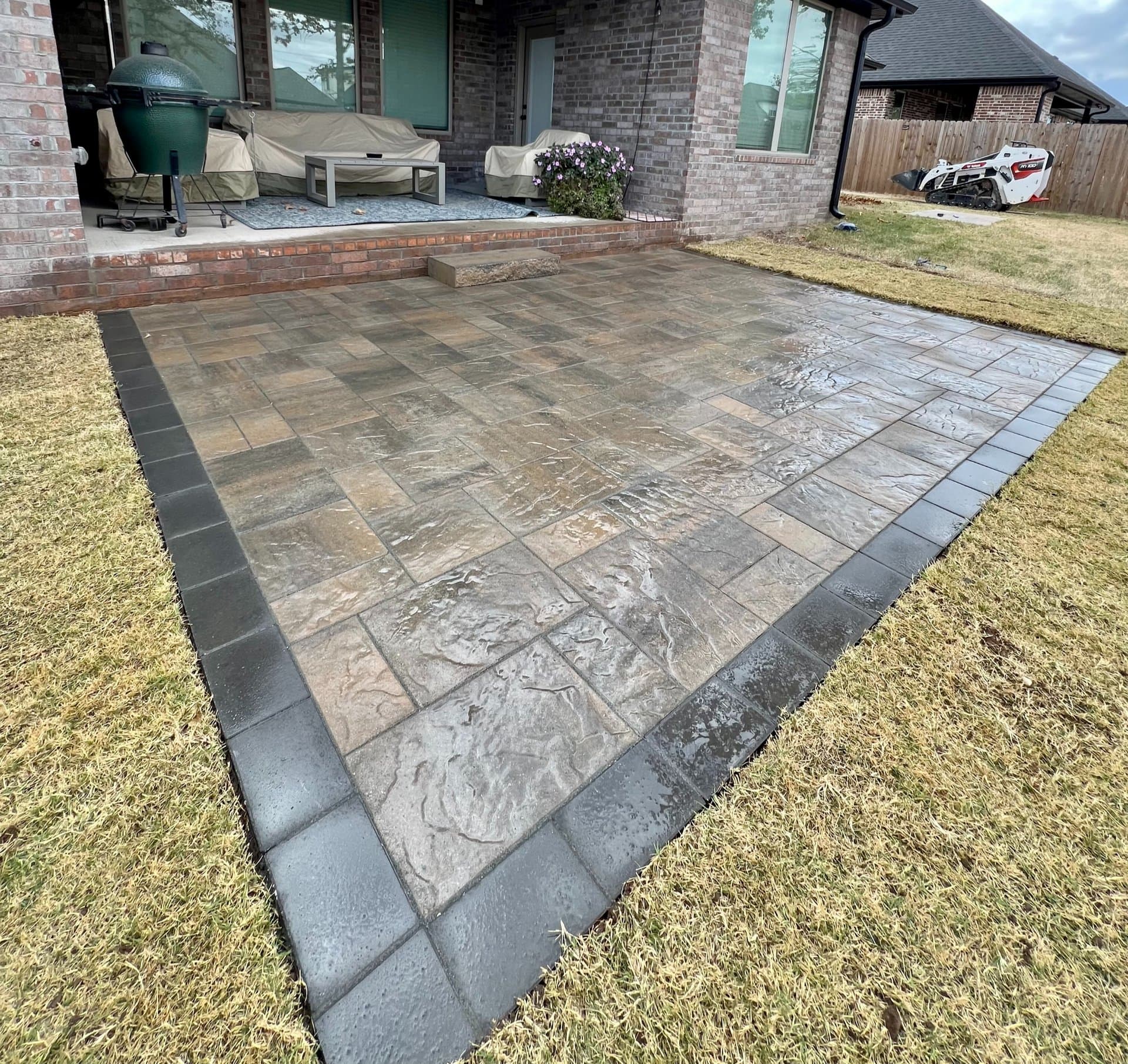 Paver patio with interlocking pavers installed by Pristine Concrete in Northwest Arkansas